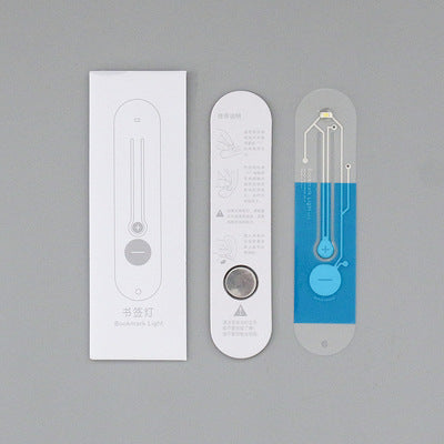 High-tech reading lamp design with user manual and transparent circuitry diagram, showcasing innovative features.