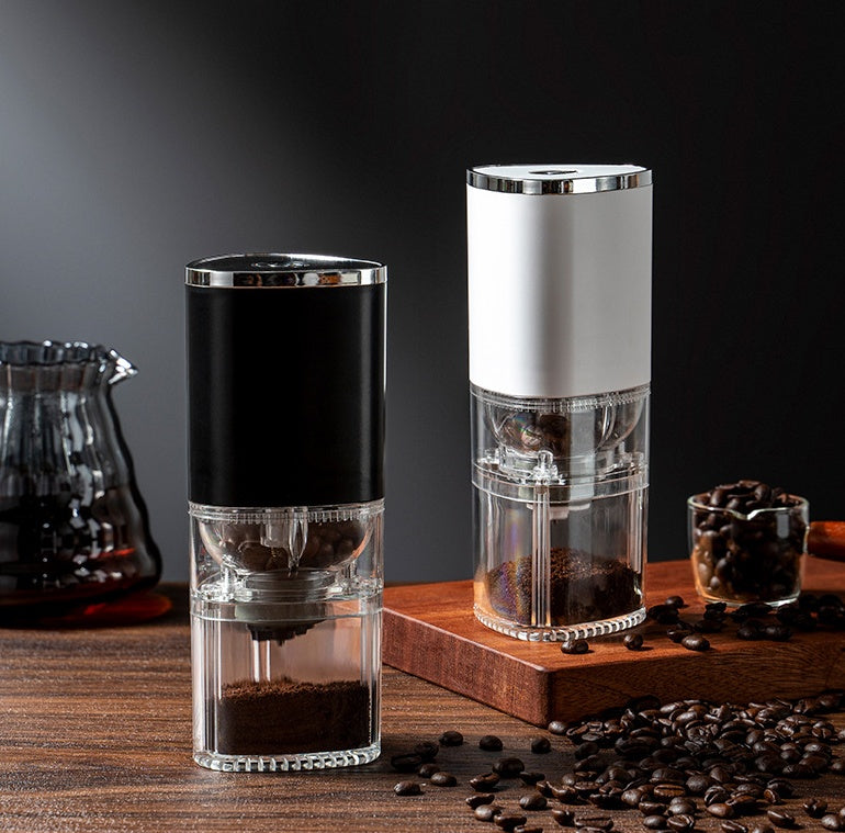 Electric coffee blade grinder in black and white, designed for precise coffee grinding and flavor preservation.