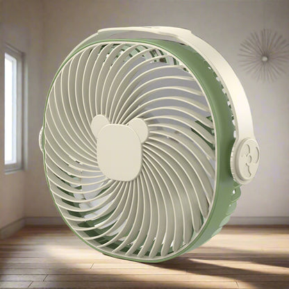 Portable USB home fan in green and white, ideal for home or travel, enhancing comfort and style.