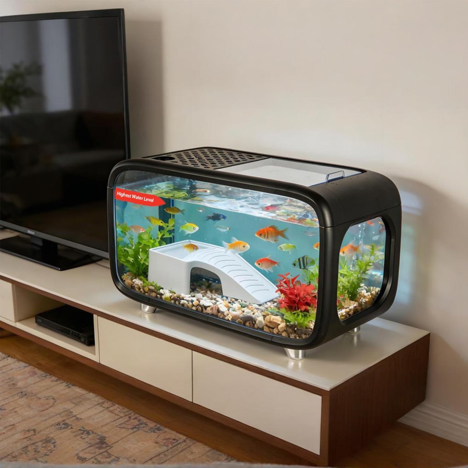 Compact betta fish tank kit with colorful fish in a modern aquarium setup.