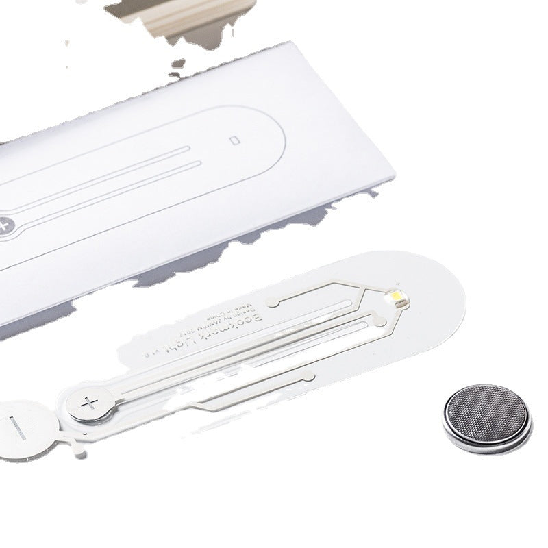 High-tech reading lamp components including LED light strip and battery, designed for efficient illumination.